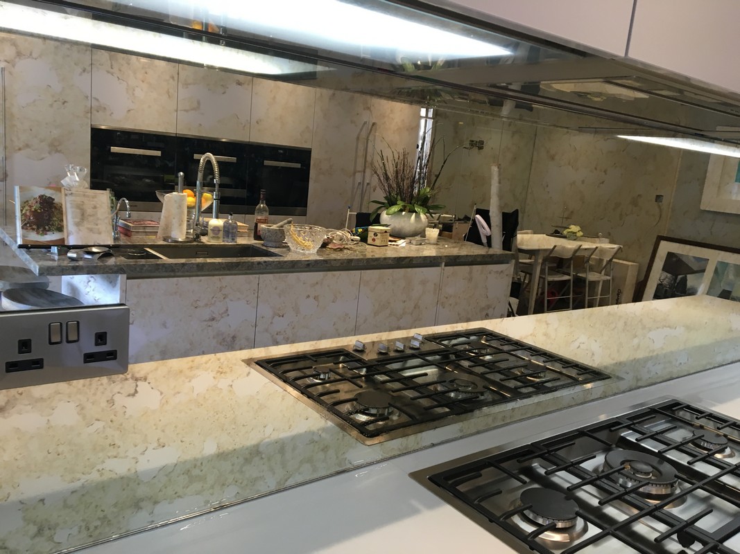 Mirror glass splashback in Roehampton luxury kitchen
